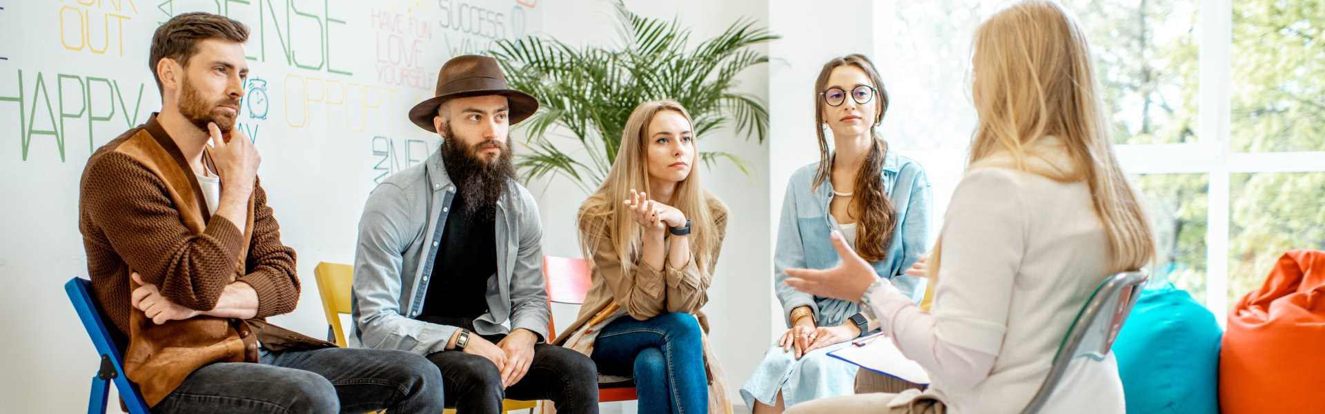 group of people listening to the therapist