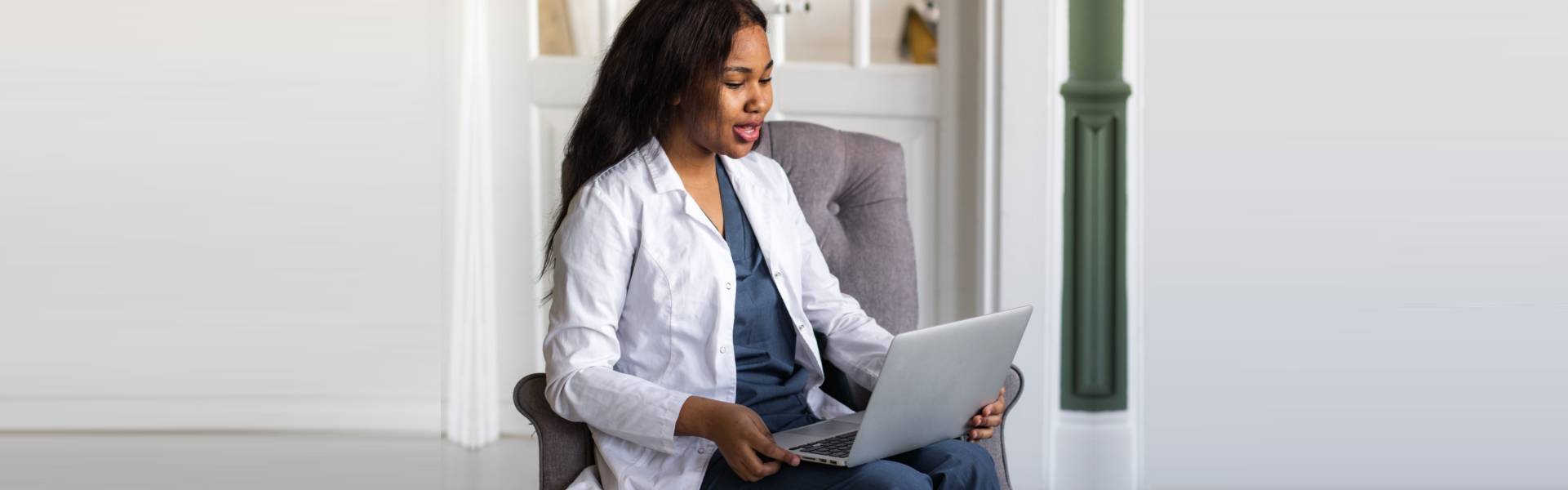 female therapist using laptop